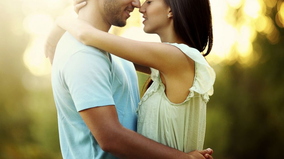 A Romantic Couple Kissing · Free Stock Photo