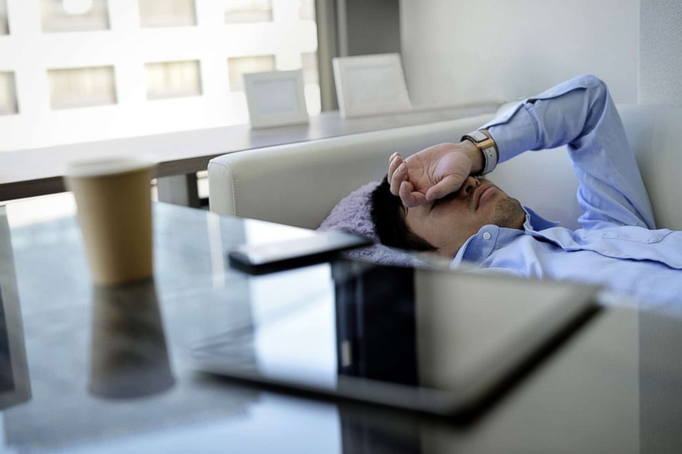 PHOTO: A teen rests on the couch.