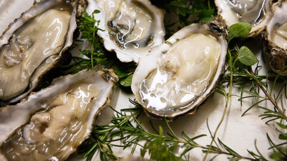 Raw oysters are pictured in this stock image.