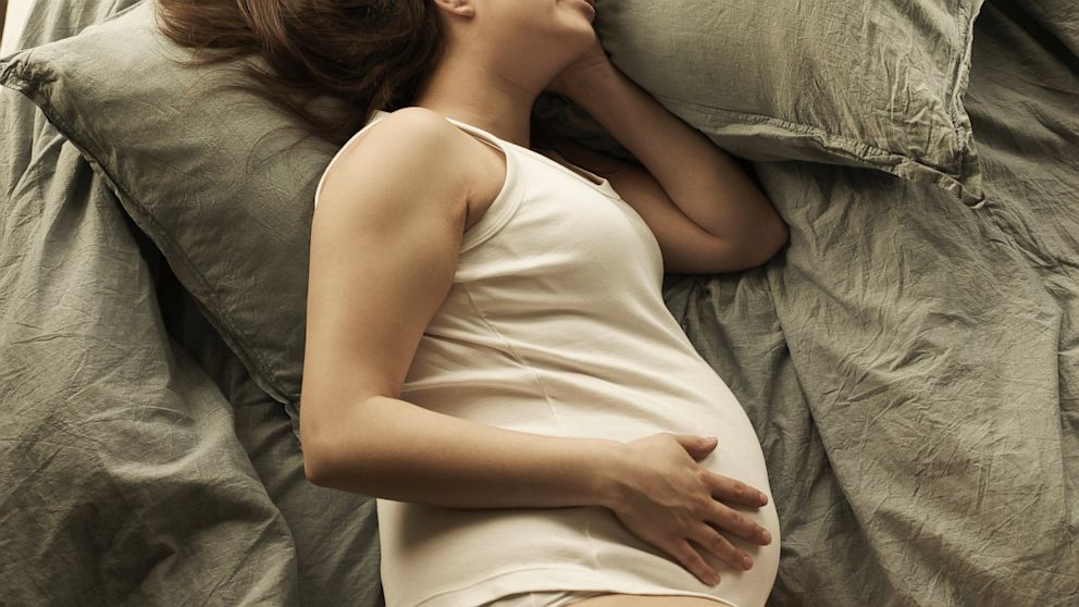 Here are some tips to sleeping better when you are pregnant.
