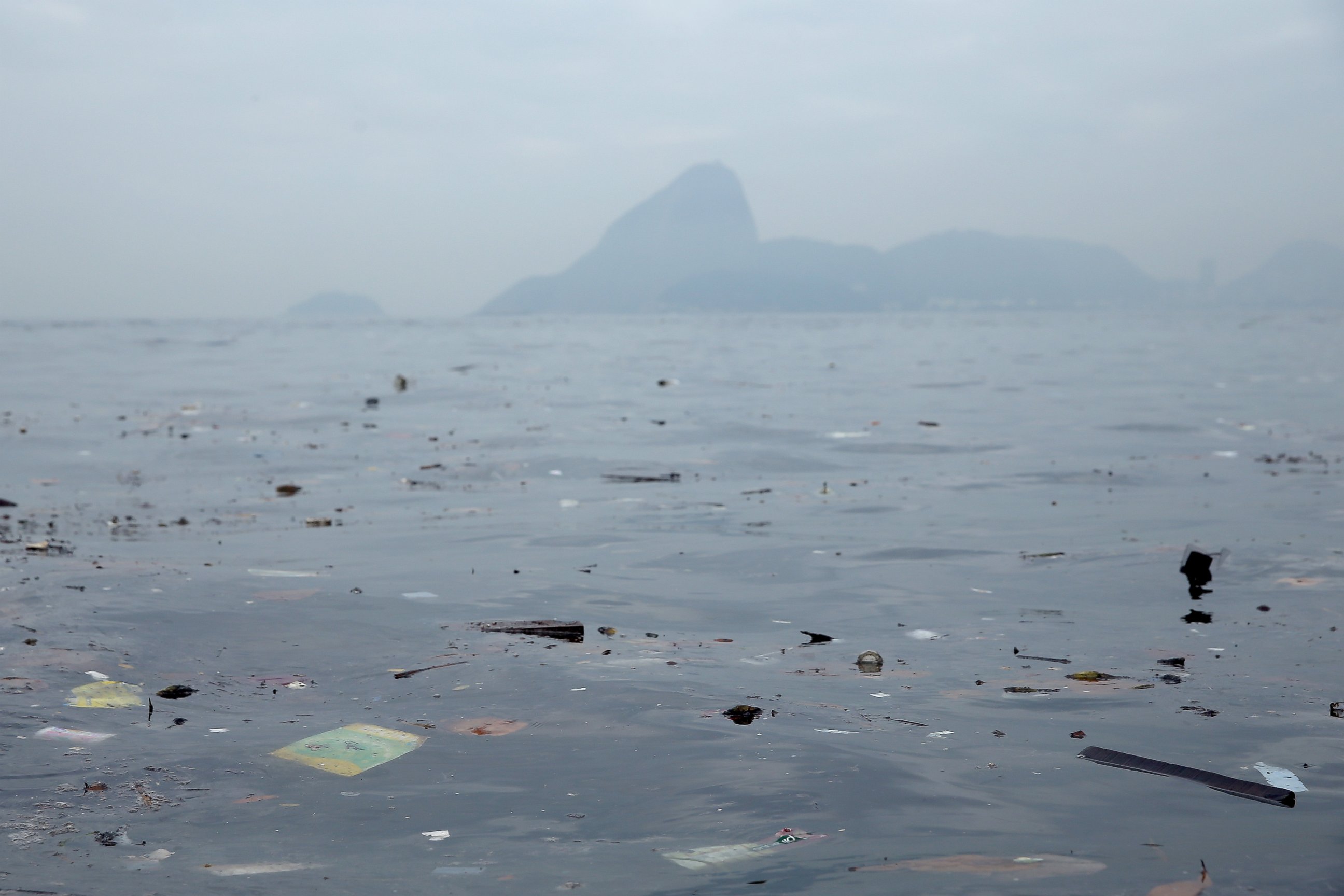 PHOTO: Pollution floats in Guanabara Bay, site of sailing events for the Rio 2016 Olympic Games, July 29, 2015 in Rio de Janeiro.
