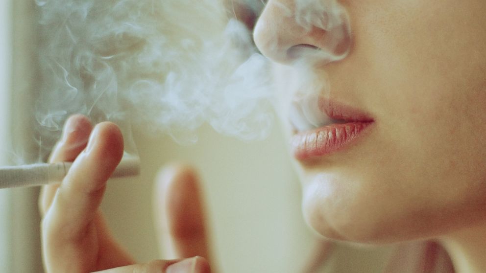 A young smoker is pictured in this stock photo. 