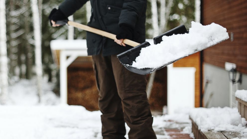 A man is pictured shoveling snow in this stock image. 
