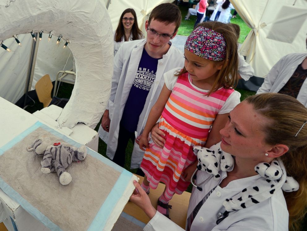 PHOTO: Paula, age 5, attends the computed tomography of her stuffed cat Trudi at the Teddy Clinic on June 4, 2014 in Giessen, Germany.