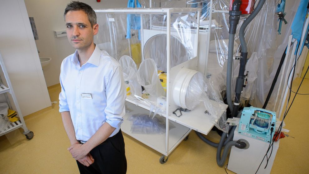 Doctor Stephen Mepham poses next to some of the facilities in place at the Royal Free Hospital in north London, Aug. 6, 2014, in preparation for a patient testing positive for the Ebola virus.
