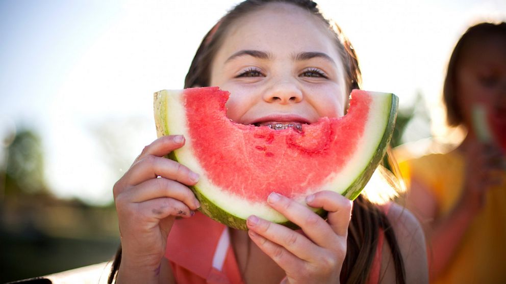 Popping some watermelon into your mouth is a great way to rehydrate after a long day in the sun.