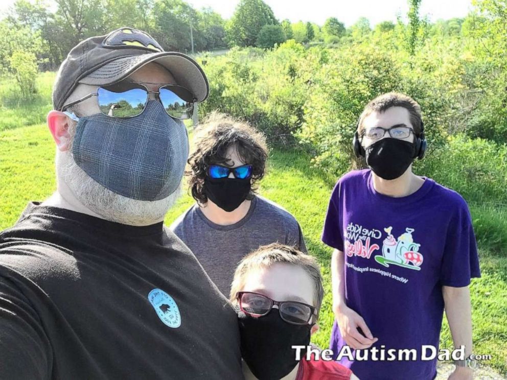 PHOTO: Rob Gorski of Canton, Ohio, and his three autistic sons -- Elliot, Emmet and Gavin -- have practiced mask wearing for short periods of time to overcome anxiety from the sensation of confinement.