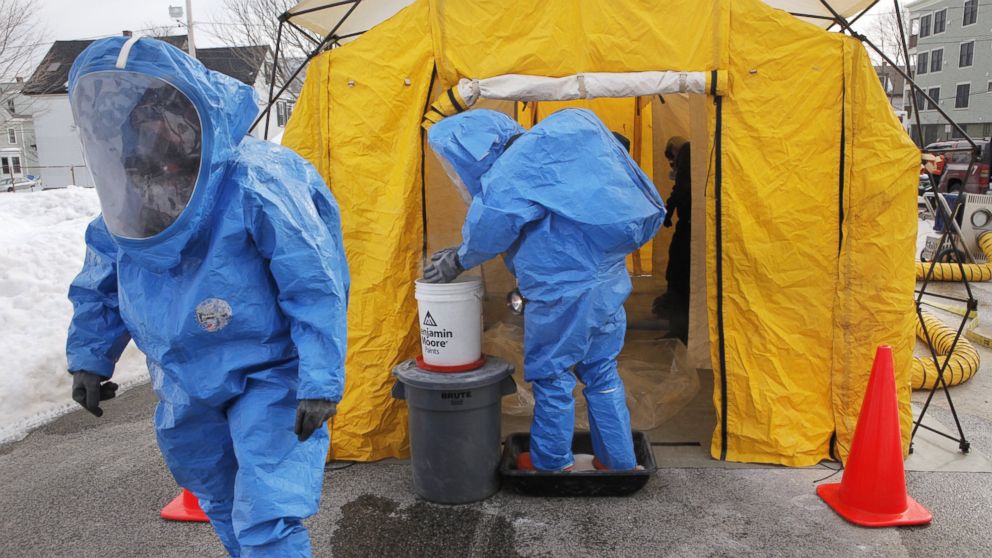 Members of the Portland Fire Department enter a decontamination tent during a hazmat training exercise n Portland, Ore. on Feb. 9, 2011. 