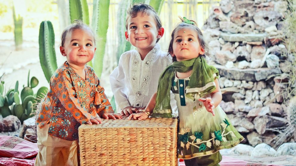 Blaze, Dylan and Jett Wile dressed in Indian garb. Their parents plan to keep their connection to their birthplace alive.
 