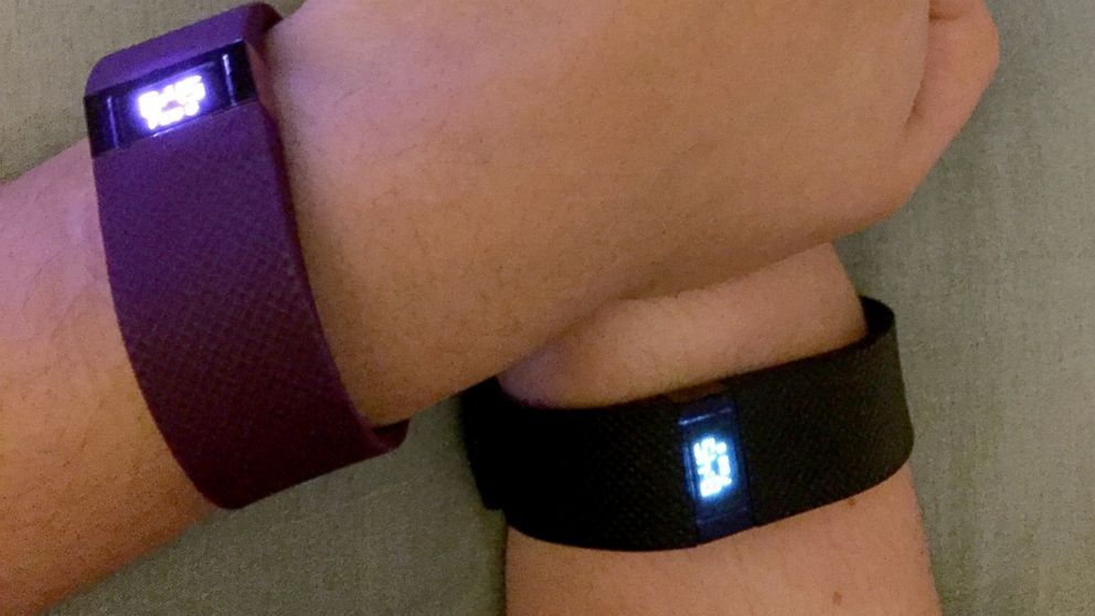 David and Ivonne Trinidad with their Fitbit bands. 
