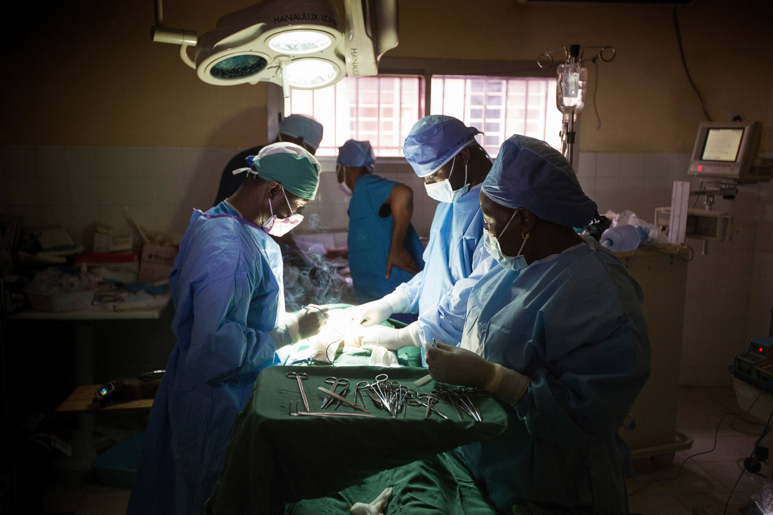 PHOTO: Dr. Martin Salia, left, performs surgery at the United Methodist Church's Kissy Hospital