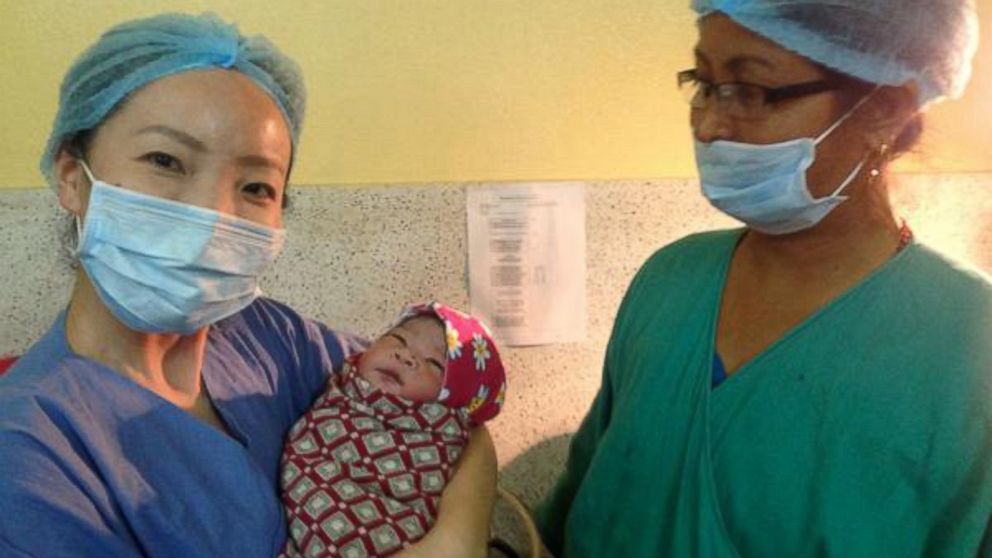 Doctors w/o Borders posted this photo to Twitter on May 4, 2015 with the caption, "MSF surgical team in #Nepal deliver the first baby of earthquake survivors in Bhaktapur." 