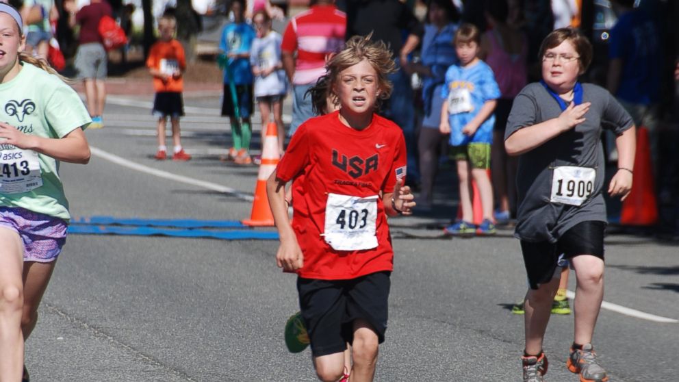 Reinhardt Harrison, 10, of Church Falls, Virginia, set a new world record for fastest half marathon by someone his age. 