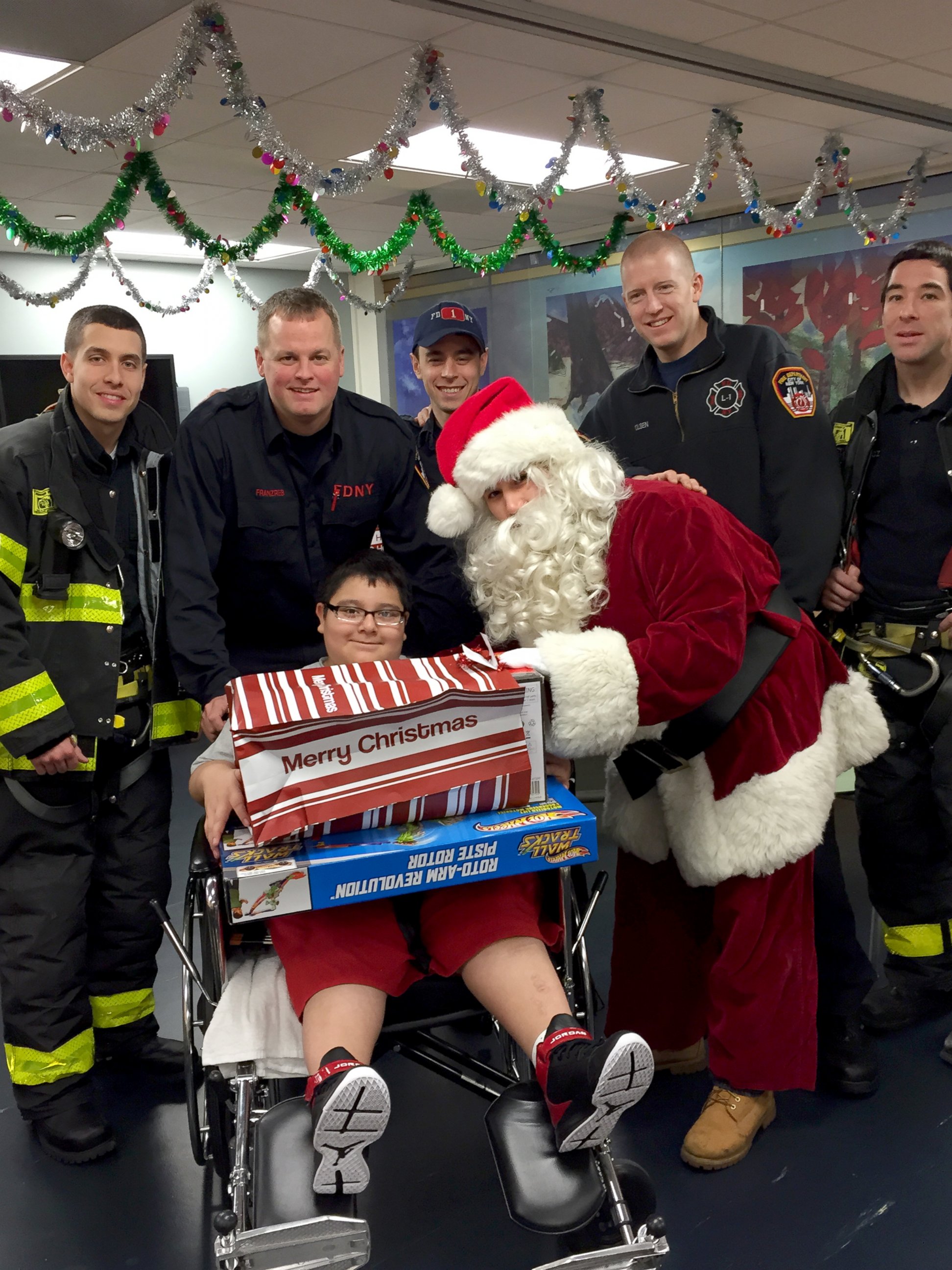 PHOTO: Santa visited NYU Langone patients today with his helpers: New York City firefighters.