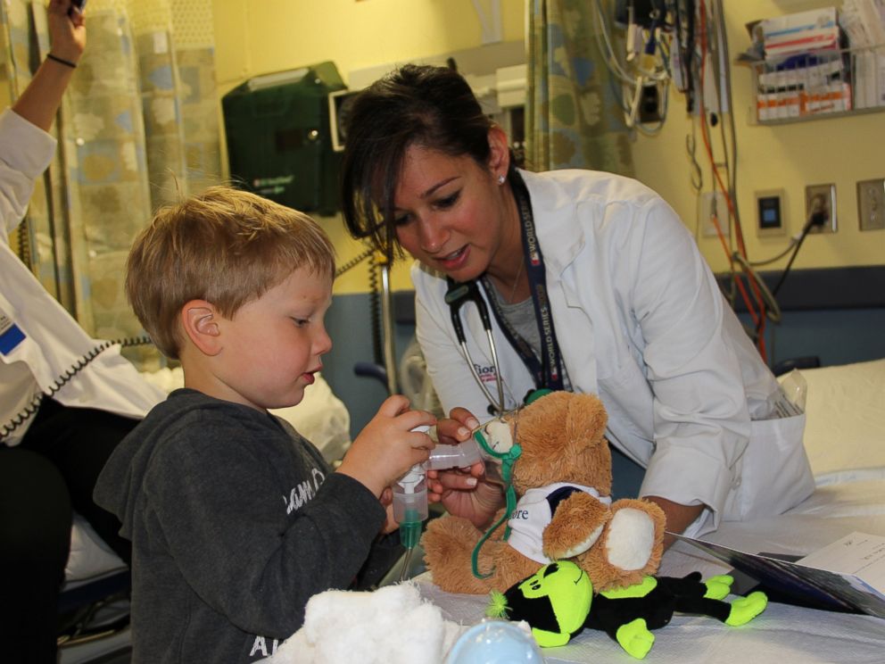 child with teddy bear