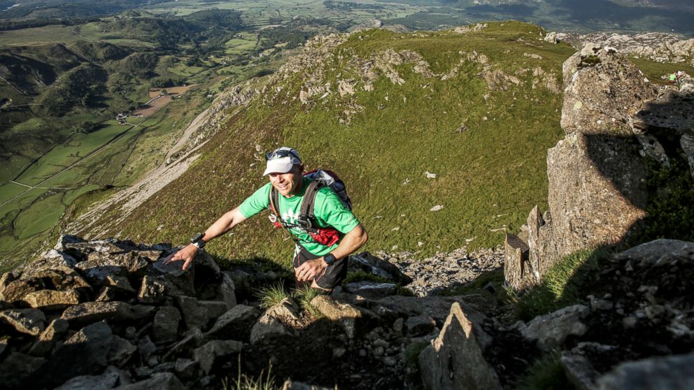 PHOTO: Gavin Woody navigates a technical mountaineering portion of a five-day race from north to south Wales called the Dragon's Back in 2015