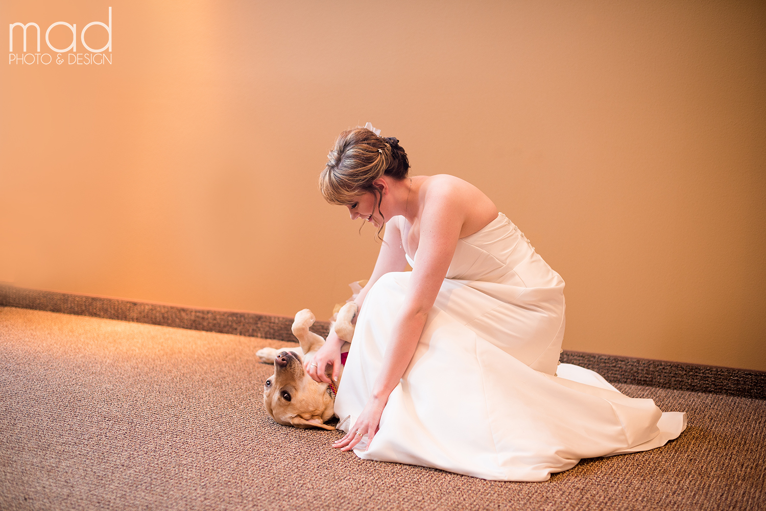 PHOTO: Wedding photographer Maddie Peschong captured tender moments between bride Valerie Parrott and her service dog, Bella, at Parrott's recent wedding.