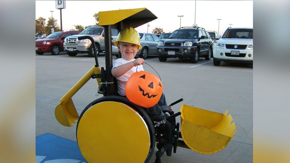 PHOTO: Caleb McLelland is pictured here at age 3 as "Bob the Builder" in a "Backhoe/Scoop truck" wheelchair costume designed by his mother Cassie McLelland for Halloween 2008. 
