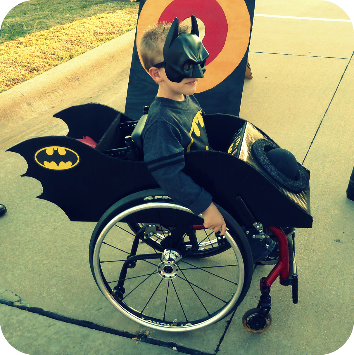 PHOTO: Caleb McLelland is pictured here at age 6 as Batman in a "Batmobile" wheelchair designed by his mother Cassie McLelland for Halloween 2011. 