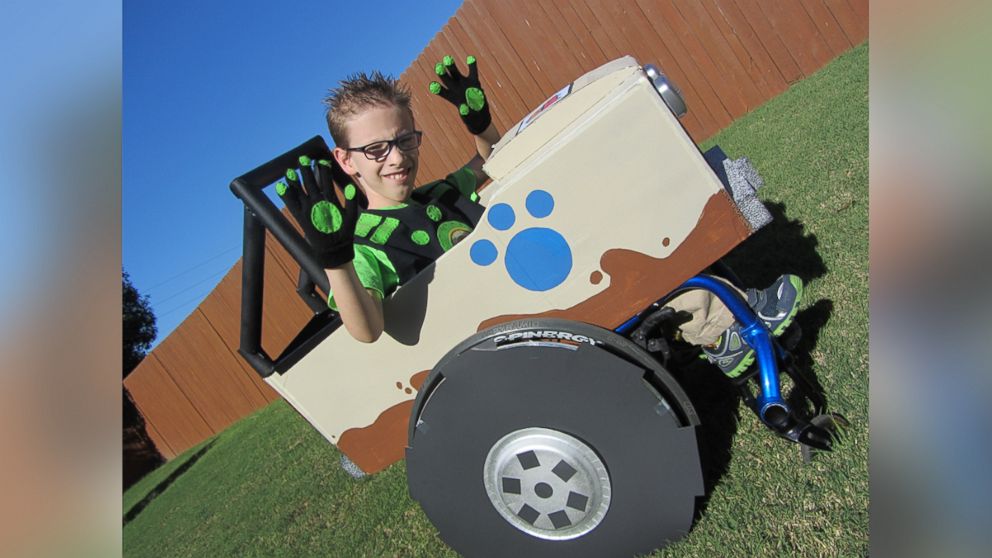 PHOTO: Caleb McLelland is pictured here at age 9 as a Kratt "Brother" driving a "Createrra" wheelchair designed by his mother Cassie McLelland for Halloween 2014. 