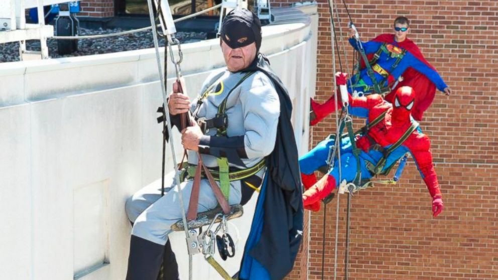 PHOTO: These window washers took a break from their day jobs to dress up as superheroes