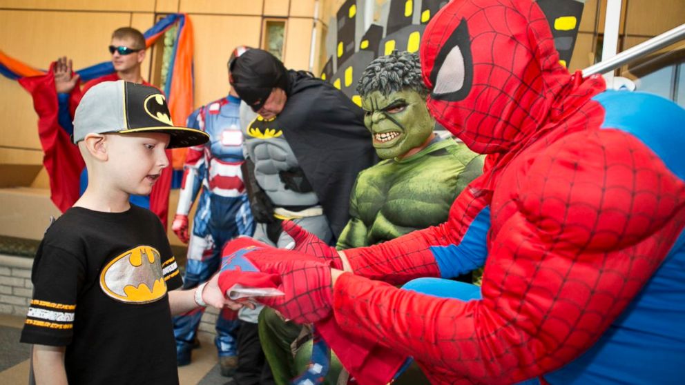 PHOTO: John Carroll, 48, ordered the costumes for the window-washing team. He got to be Spiderman.