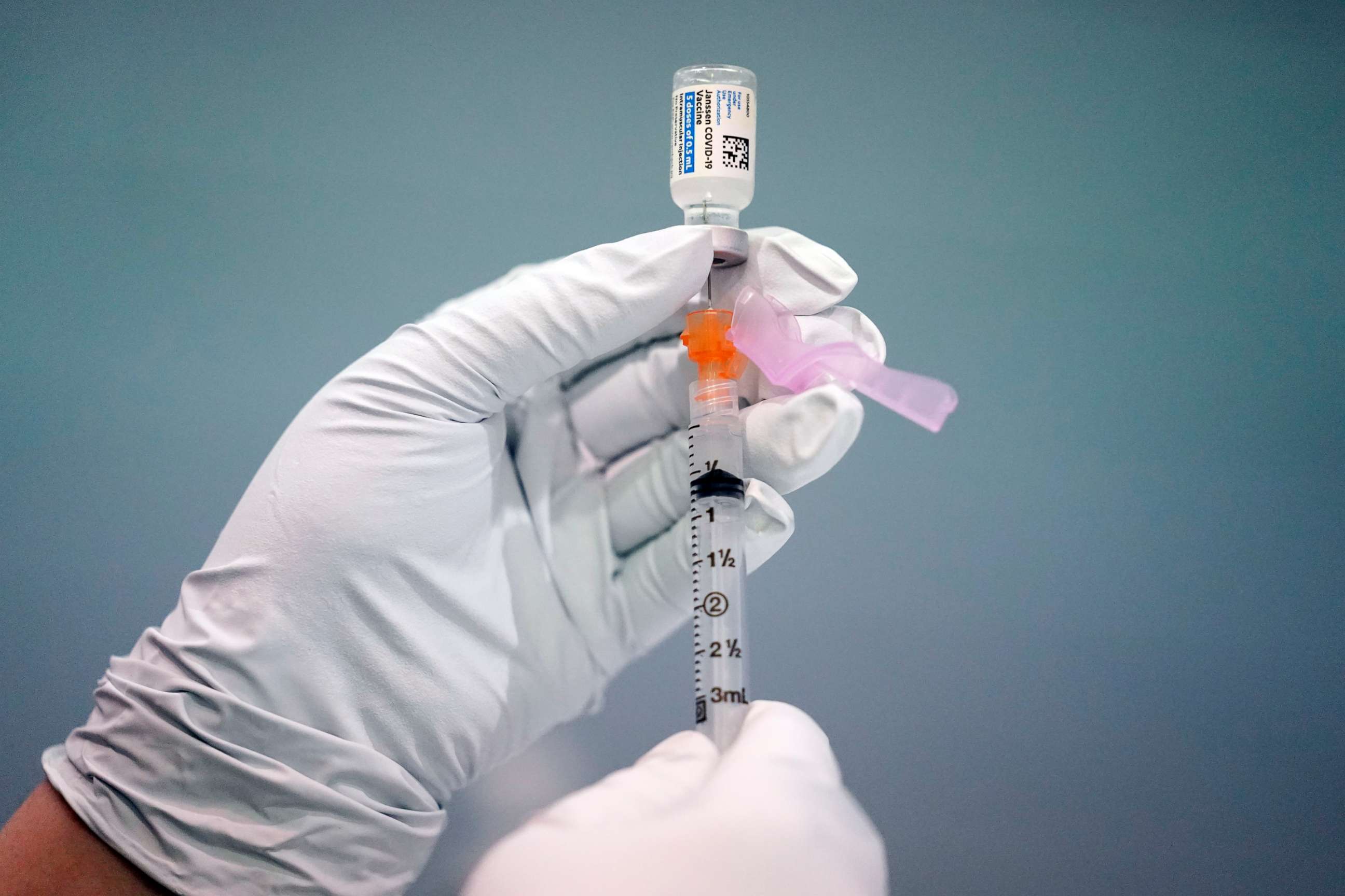 PHOTO: A member of the Philadelphia Fire Department prepares a dose of the Johnson & Johnson COVID-19 vaccine at a vaccination site setup in Philadelphia, March 26, 2021. 