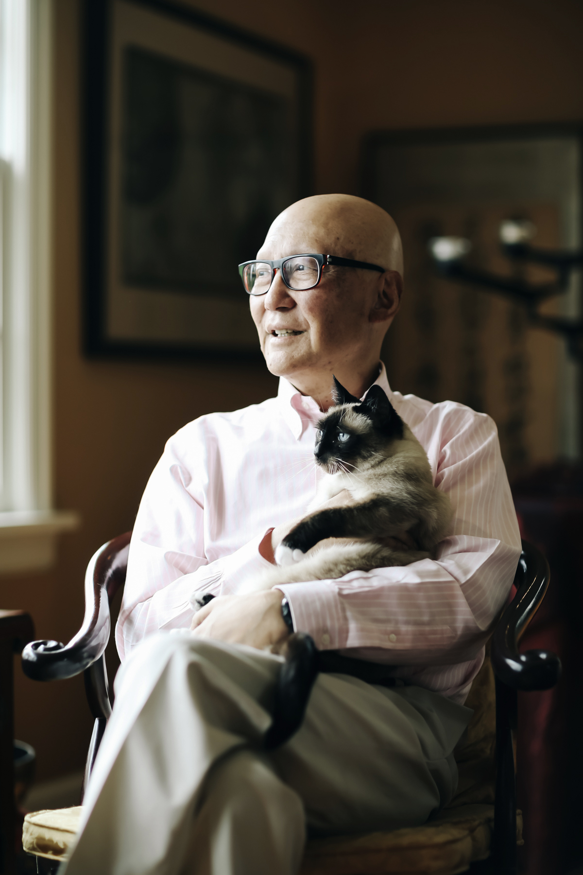 PHOTO: Naito cuddles his cat, Dolly, at his Portland, Ore., home in May 2019. The poor delivery of Naito’s diagnosis with stage 4 pancreatic cancer left him determined to share his experience with future physicians.