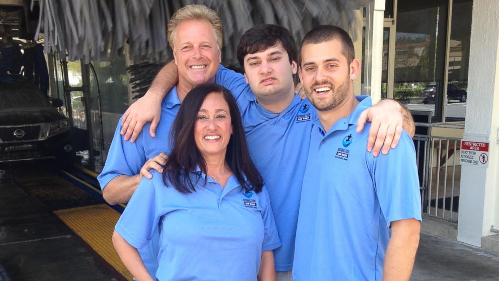 PHOTO: The D'Eri family poses for a photo at Rising Tide Car Wash.
