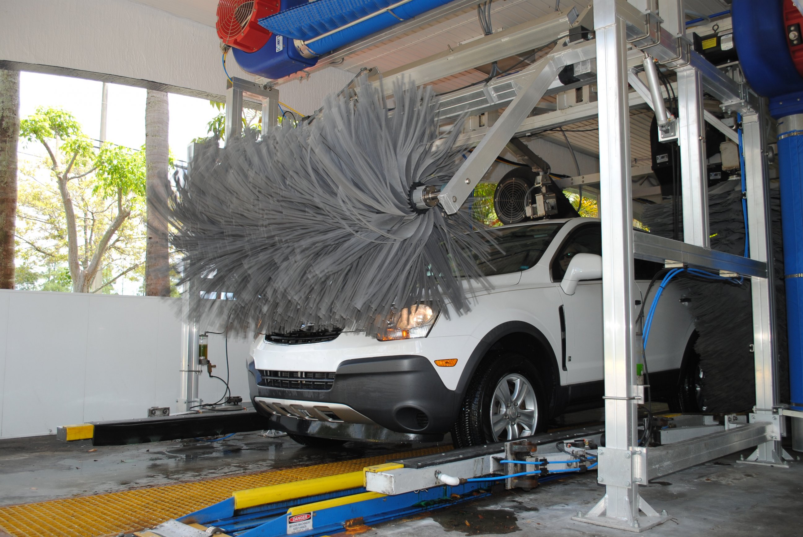 PHOTO: A car gets washed at Rising Tide Car Wash.
