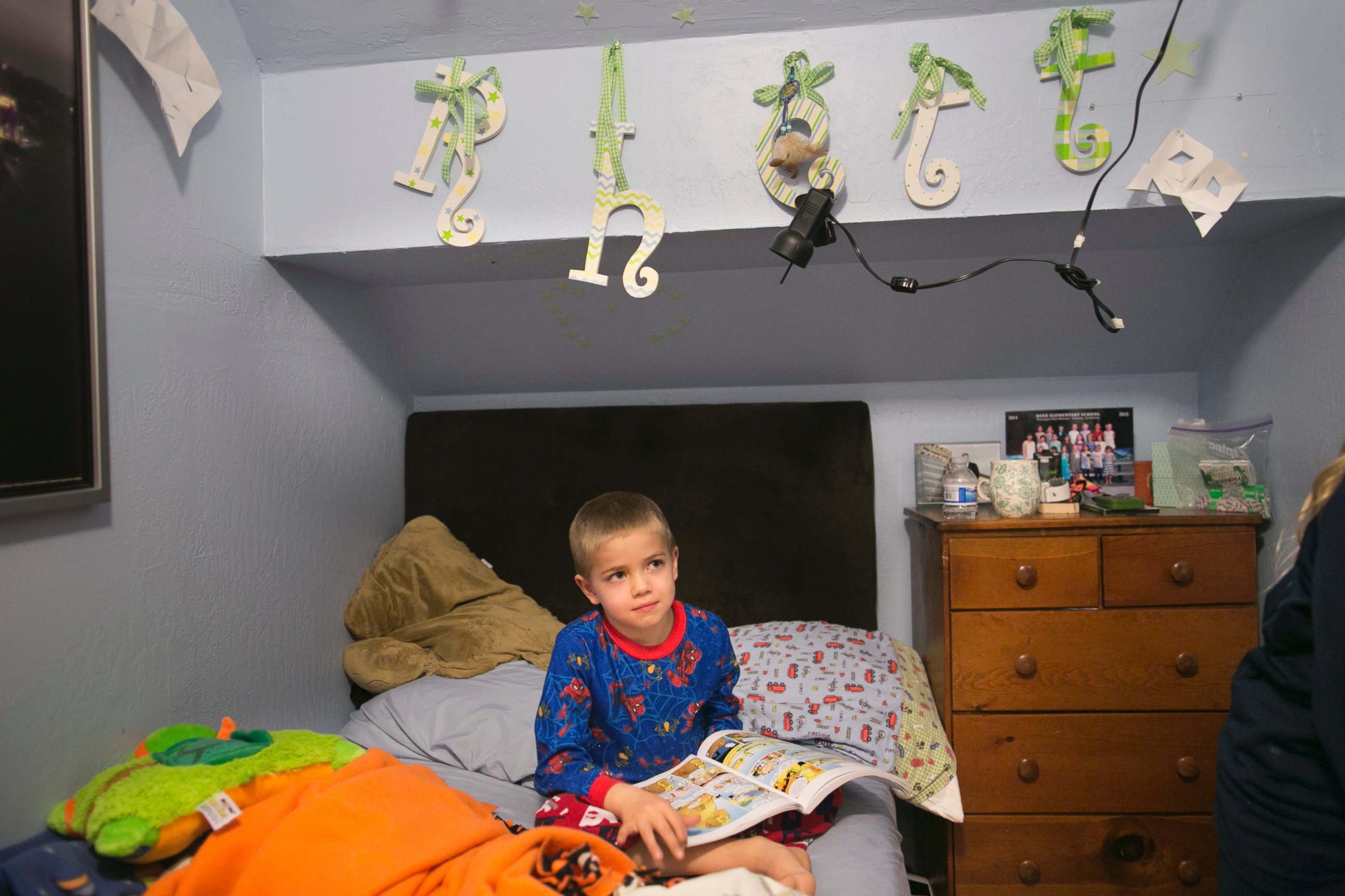 PHOTO: Rhett Krawitt sits on a bed in his home in Corte Madera, Calif. Jan. 28, 2015. 