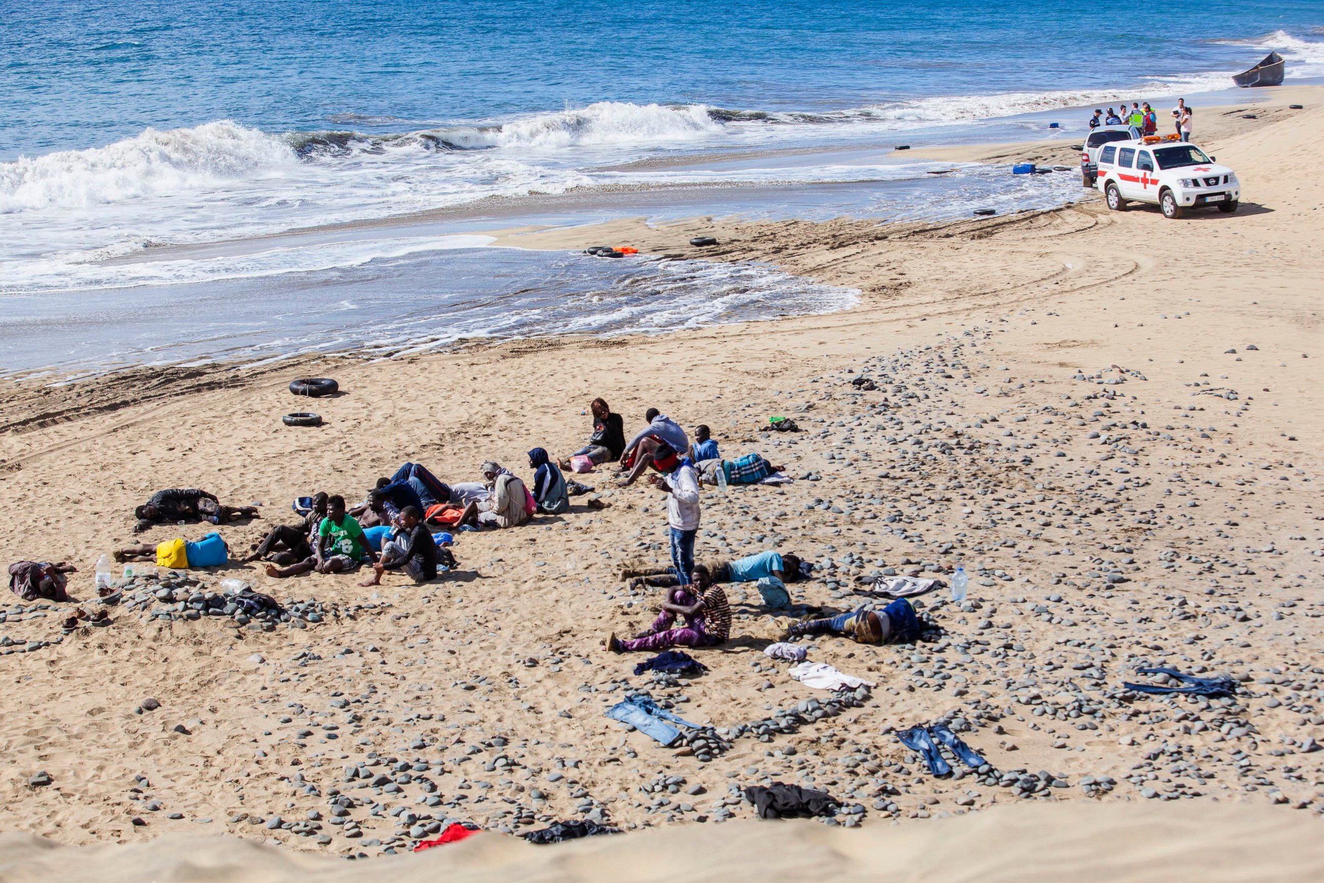 PHOTO: People who arrived by boat from Africa rest at Maspalomas beach on Gran Canaria, Spain's Canary Islands, Nov. 5, 2014. 