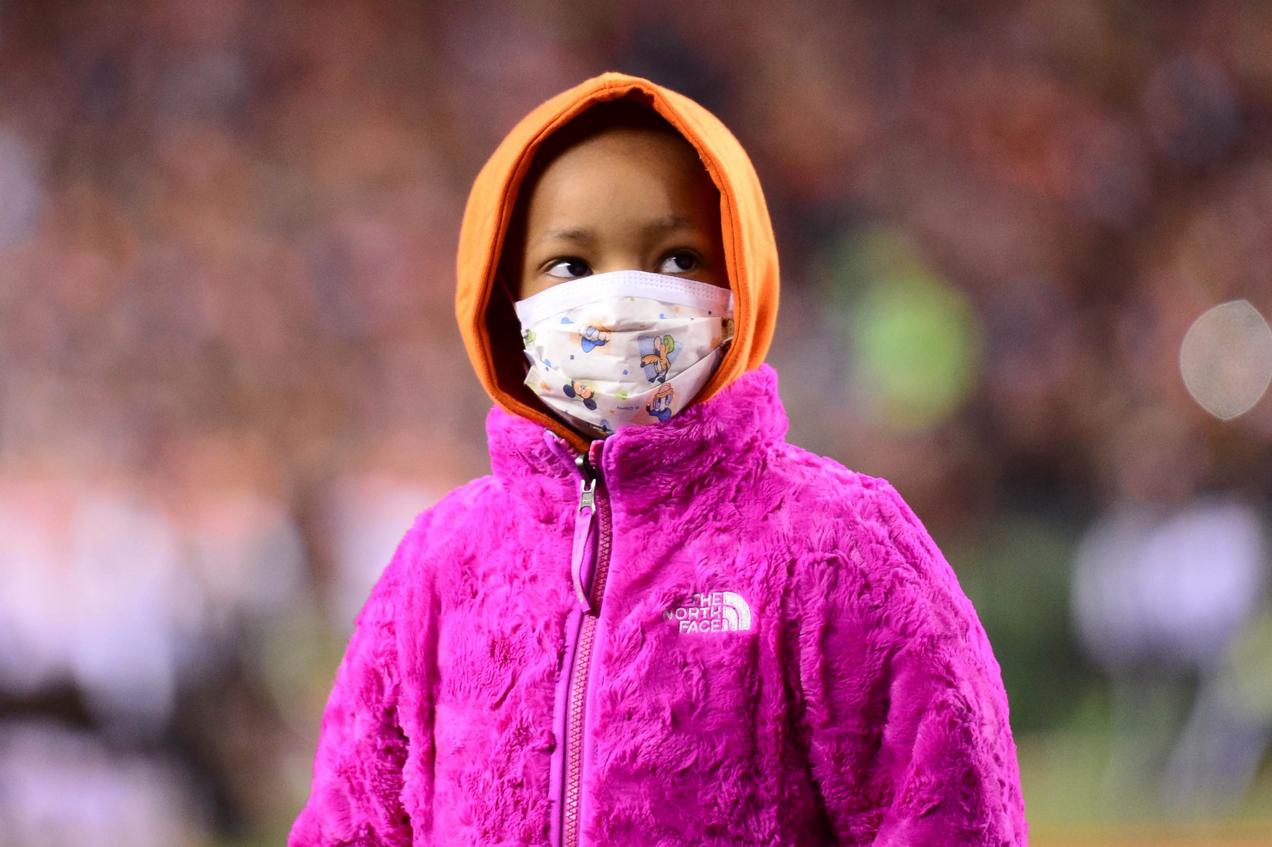 PHOTO: Leah Still daughter of Cincinnati Bengals defensive tackle Devon Still stands on the field during the first quarter against the Cleveland Browns at Paul Brown Stadium, Nov. 6, 2014.