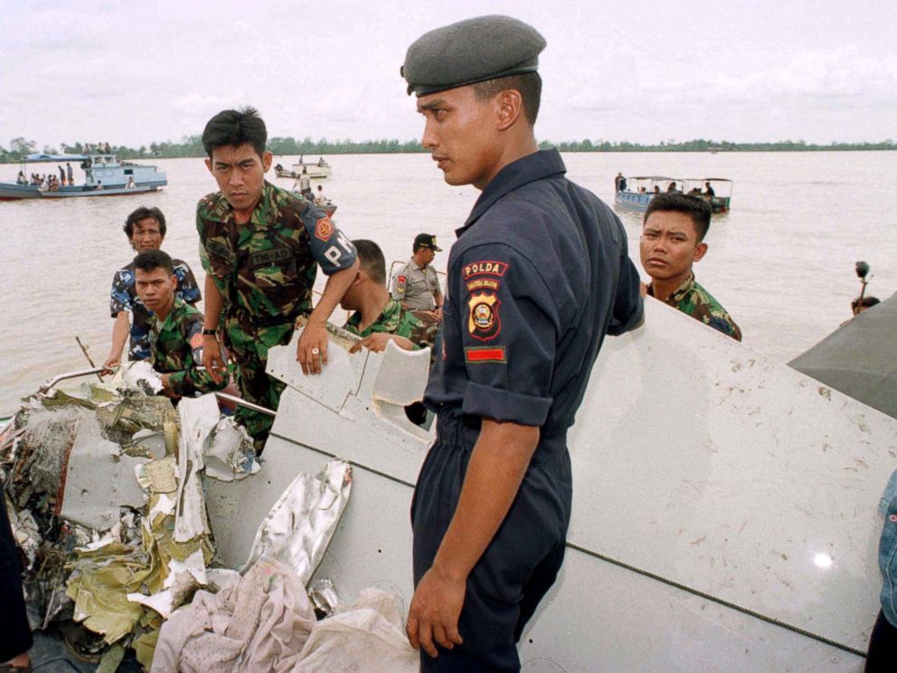 PHOTO: Indonesian military officers guard the debris of the SilkAir Boeing 737-300 at the plane's crash site in Indonesia, Dec. 20, 1997.