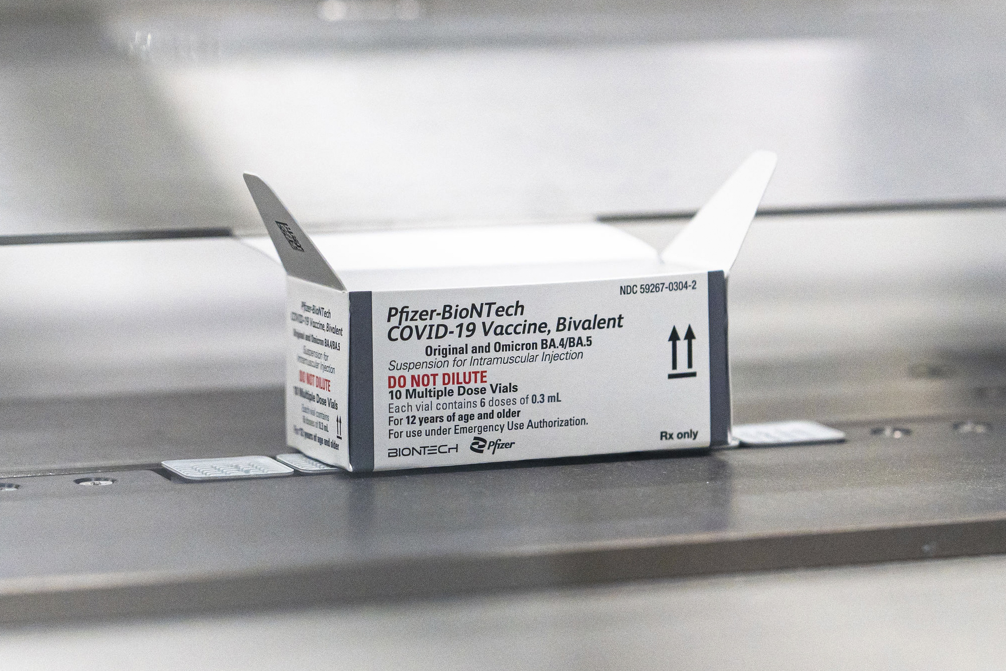 PHOTO: This August 2022 photo provided by Pfizer shows packaging for the company's updated COVID-19 vaccine during production in Kalamazoo, Mich. 