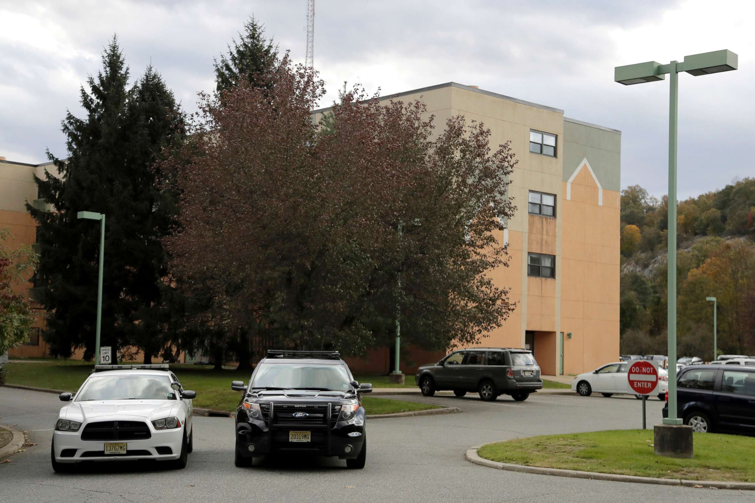 PHOTO: Police cruisers are seen parked near the entrance of the Wanaque Center For Nursing And Rehabilitation, where New Jersey state Health Department confirmed the 18 cases of adenovirus, Oct. 23, 2018, in Haskell, N.J.