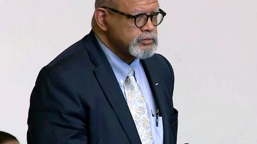 In this Tuesday, May 14, 2019 still image from video, Dr. Michael Watkins, a vascular surgeon at Massachusetts General Hospital, stands during arraignment in Boston on charges of driving drunk, striking three pedestrians in a crosswalk and then leavi
