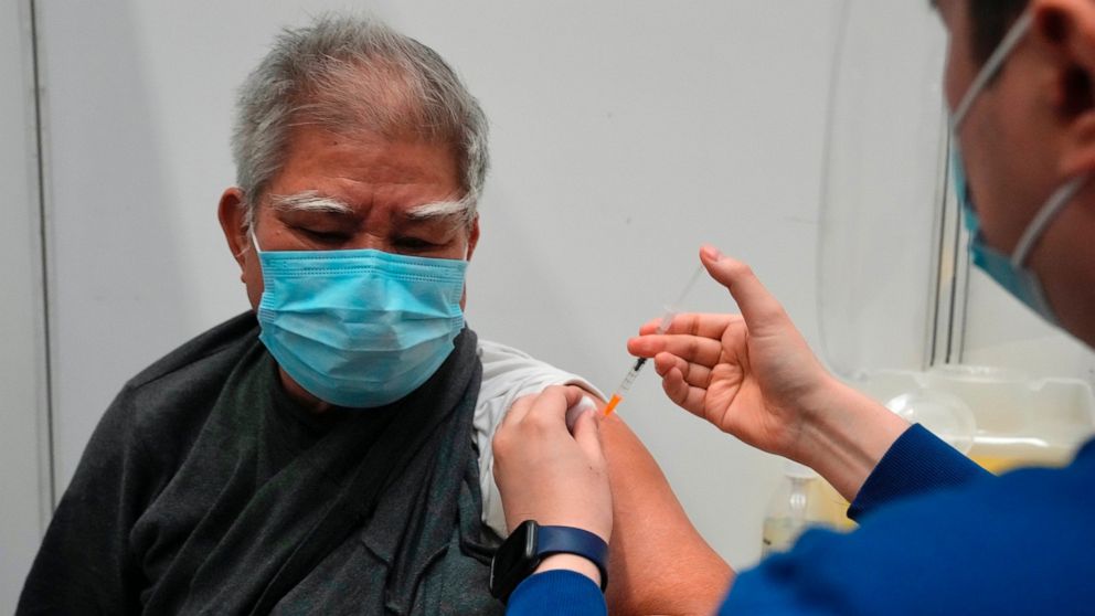 Hong Kong's new virus cases top 10,000 in spiraling outbreak