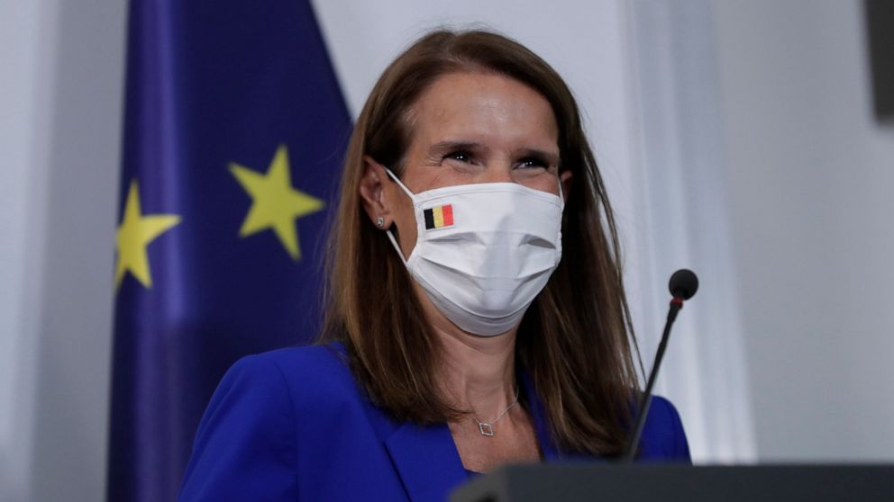 Belgian Prime Minister Sophie Wilmes, wearing a protective mask, prepares to address a press conference following the National Security Council meeting on the COVID-19 outbreak, in Brussels, Wednesday, Sept. 23, 2020. Belgium's prime minister announc