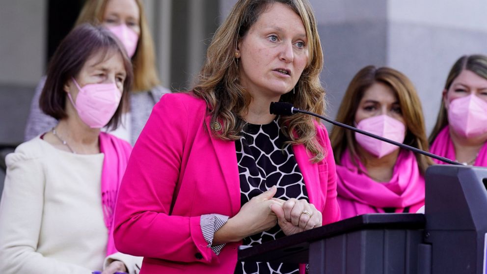 FILE - Assemblywoman Buffy Wicks, D-Oakland, speaks at a news conference at the Capitol in Sacramento, Calif., Thursday, Jan. 20, 2022. Wicks introduced a bill, Friday Feb. 11, 2022, that if approved, would mandate all businesses must require their e