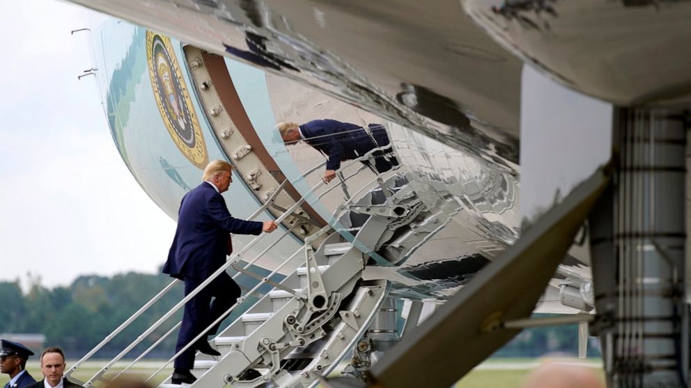 President Donald Trump boards Air Force One at Wilmington International Airport, Wednesday, Sept. 2, 2020, in Wilmington, N.C. (AP Photo/Evan Vucci)