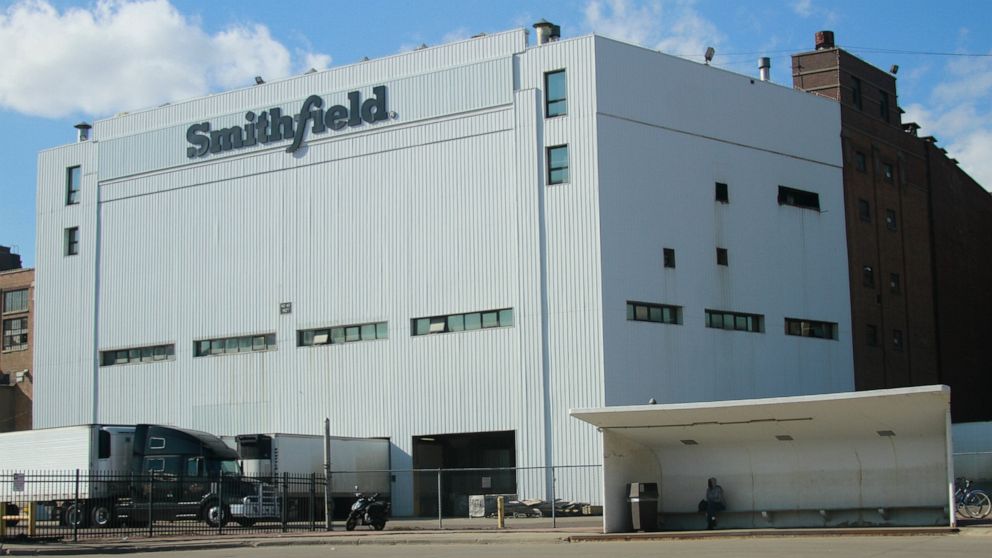 FILE - In this April 8, 2020, file photo, the Smithfield pork processing plant stands in Sioux Falls, S.D. Meat exports are surging this spring at the same time the processing industry is struggling to meet domestic demand as workers get sick with th