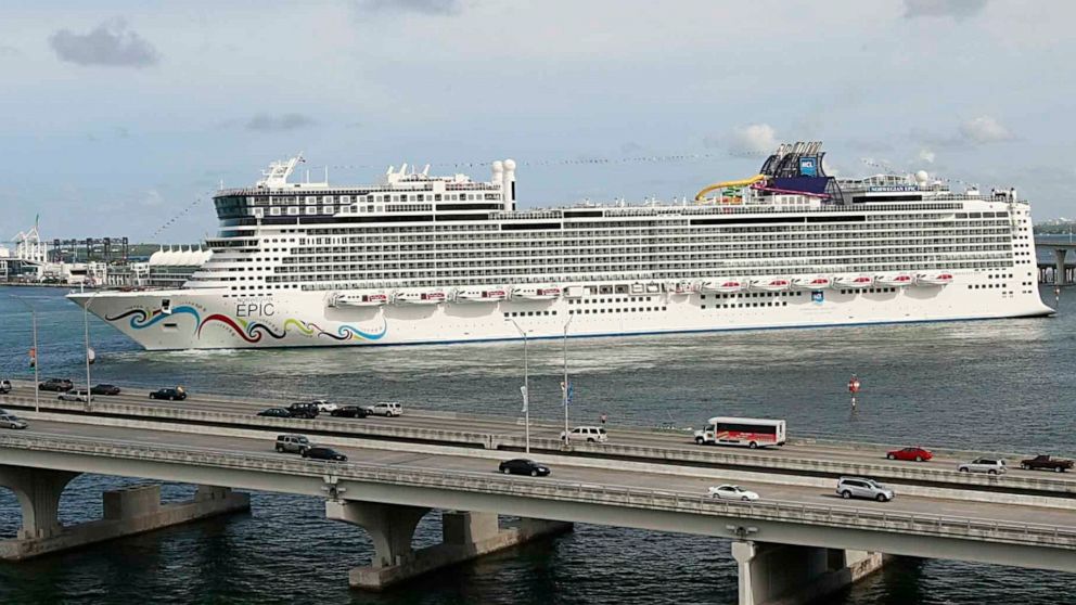FILE - In this July 7, 2010, file photo, the Norwegian Epic, owned by the Norwegian Cruise Line Corporation, sails through the Government Cut to the Port of Miami in Miami. A federal judge on Sunday night, Aug. 8, 2021, granted Norwegian Cruise Line’