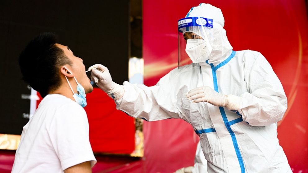 China orders mass testing in Wuhan as COVID outbreak spreads