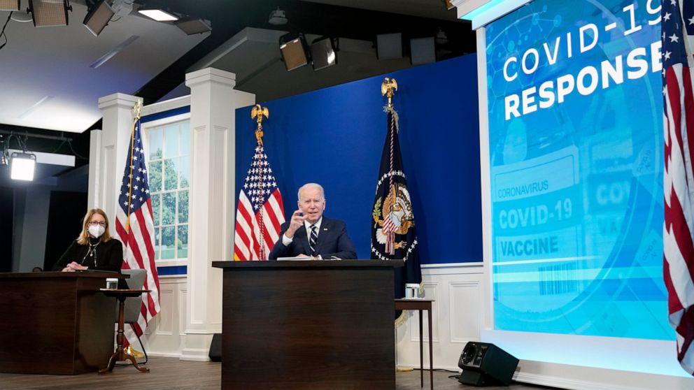 President Joe Biden, accompanied by FEMA administrator Deanne Criswell, speaks about the government's COVID-19 response, in the South Court Auditorium in the Eisenhower Executive Office Building on the White House Campus in Washington, Thursday, Jan.