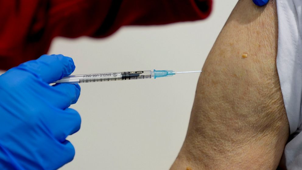 File-File photo shows a 87-year-old man getting his booster shot at the vaccination center in Frankfurt, Germany, Thursday, Nov. 11, 2021. A-60-year-old man allegedly had himself vaccinated against Covid-19 dozens of times in Germany in order to sell