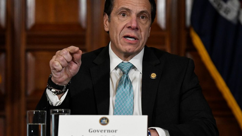 FILE- In this Jan. 29, 2019 file photo, New York Gov. Andrew Cuomo holds a news conference in the Red Room at the state Capitol in Albany, N.Y. Cuomo says he's directing state health officials to ban the sale of flavored e-cigarettes, citing the risk