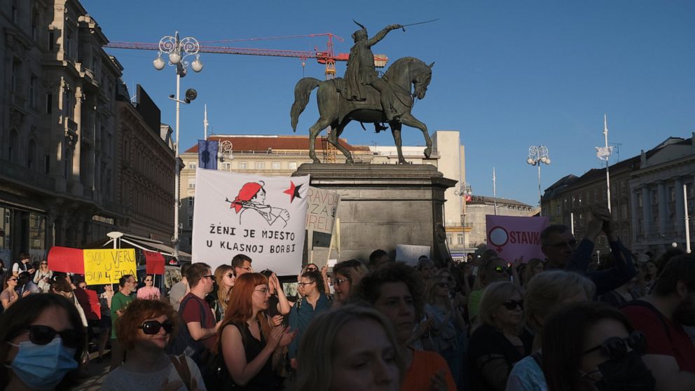 People attend a protest in solidarity with a woman who was denied an abortion despite her fetus having serious health problems, in Zagreb, Croatia, Thursday, May 12, 2022. The case has sparked public outrage and rekindled a years-long debate about ab