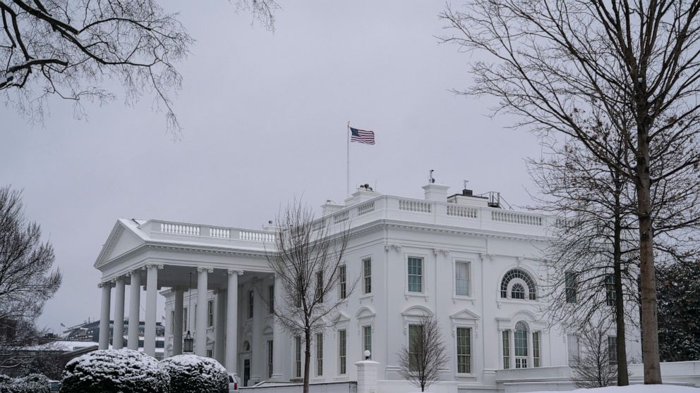 Snow covers the ground at the White House, Monday, Feb. 1, 2021, in Washington. (AP Photo/Evan Vucci)