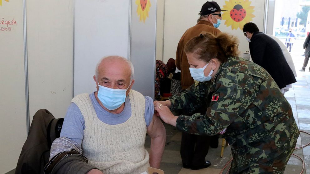 A man receives a dose of Sinovac COVID-19 vaccine in Tirana, Albania, Sunday, March 28, 2021. Albania started a mass vaccination campaign trying to inoculate half a million people opening the way to a more relaxed incoming summer tourism season. (AP 